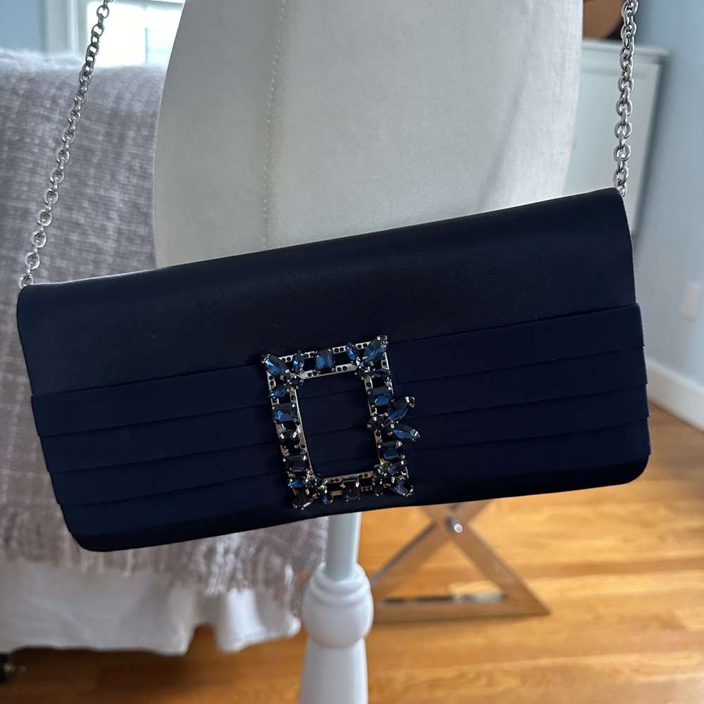 Sandra Robert’s Navy shoulder and clutch beautiful evening bag.